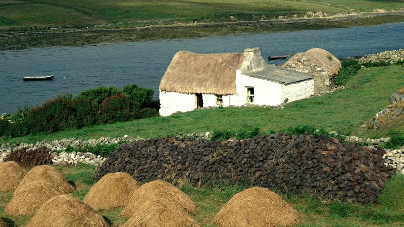 Thatched Cottage by Water