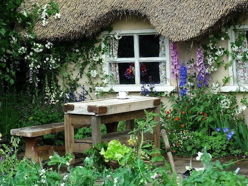 Thatched Cottage Garden — Green, Serene, Spring, Photograph, Wooden Table