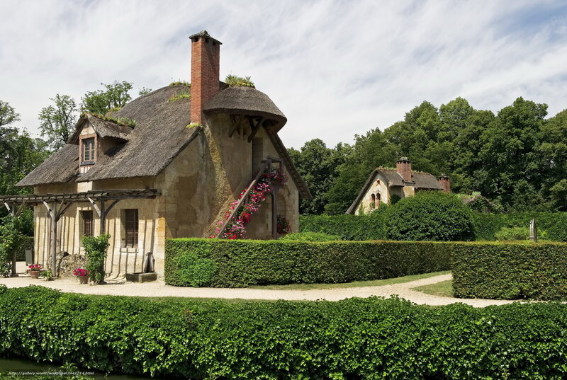 Thatched cottage in a French garden
