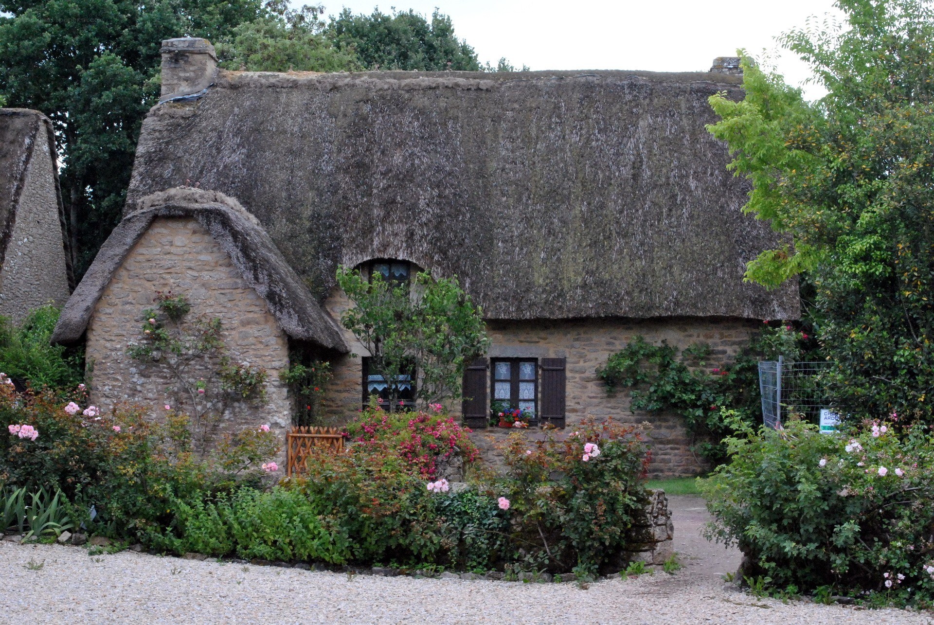 Thatched cottage in a garden