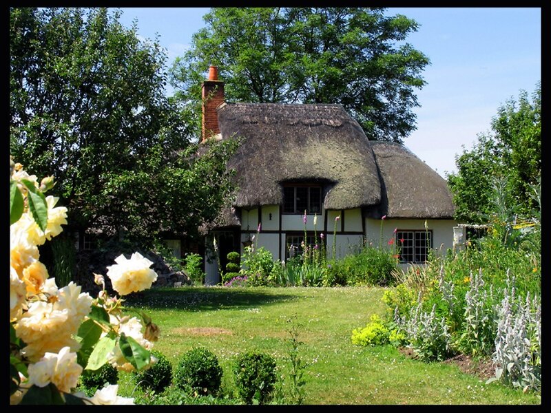 Thatched Cottage in Garden — Green, Serene