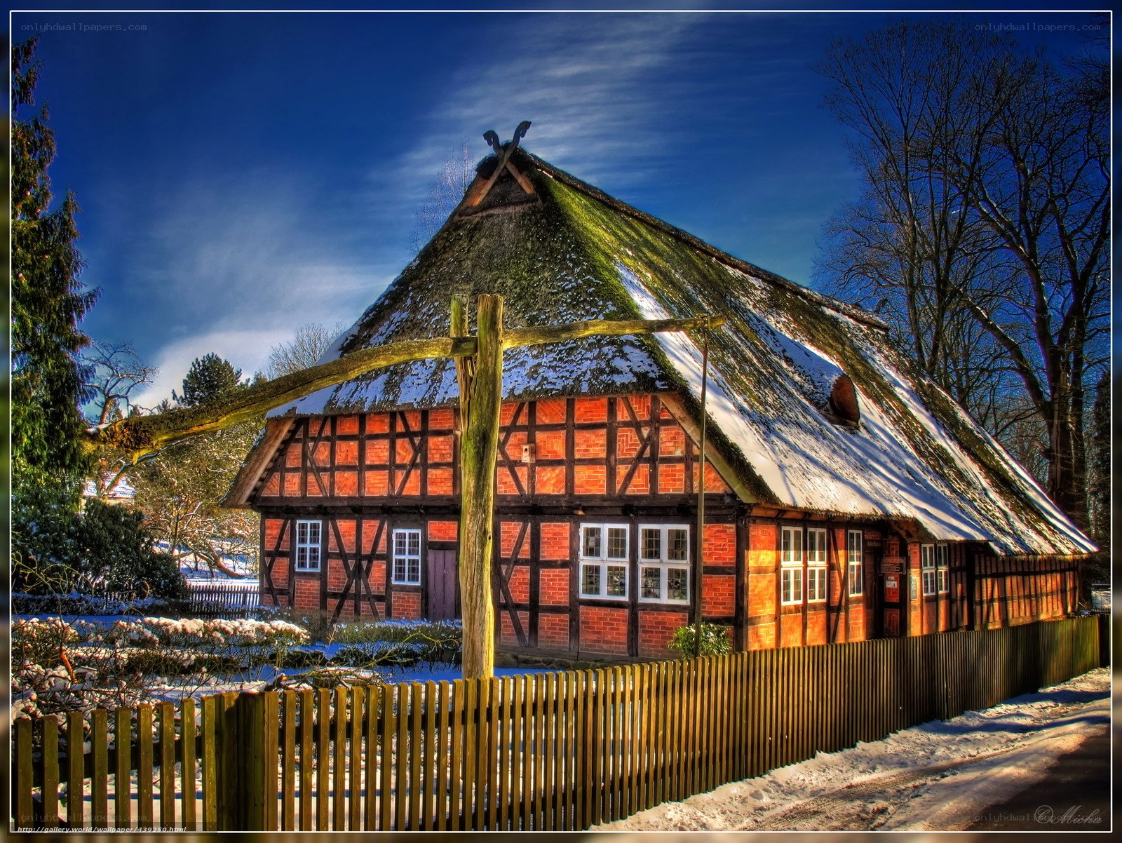 Thatched cottage in winter