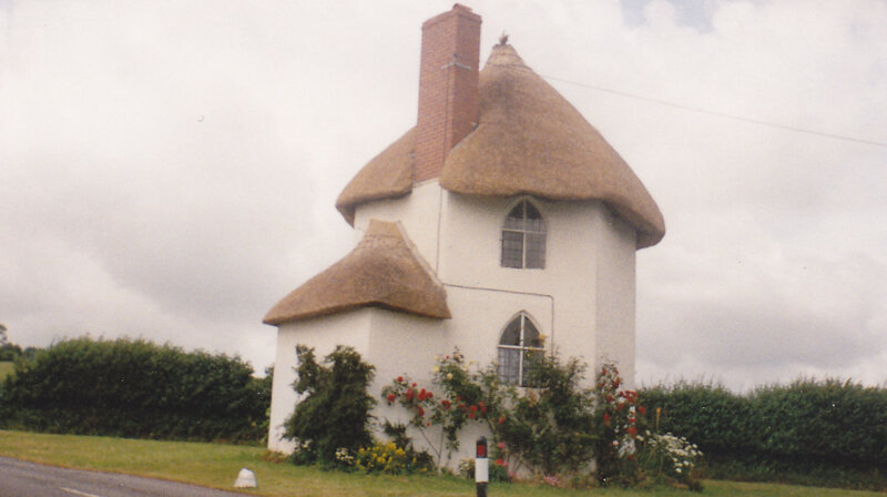 thatched cottage with chimney