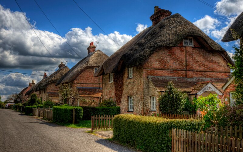 Thatched Cottages in Village — Blue