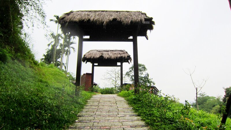Thatched Gate on Hill