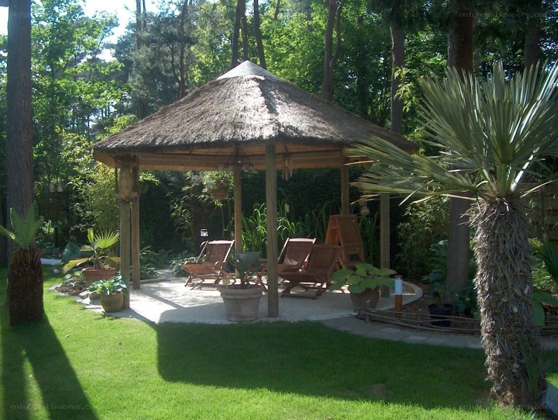 Thatched gazebo in garden
