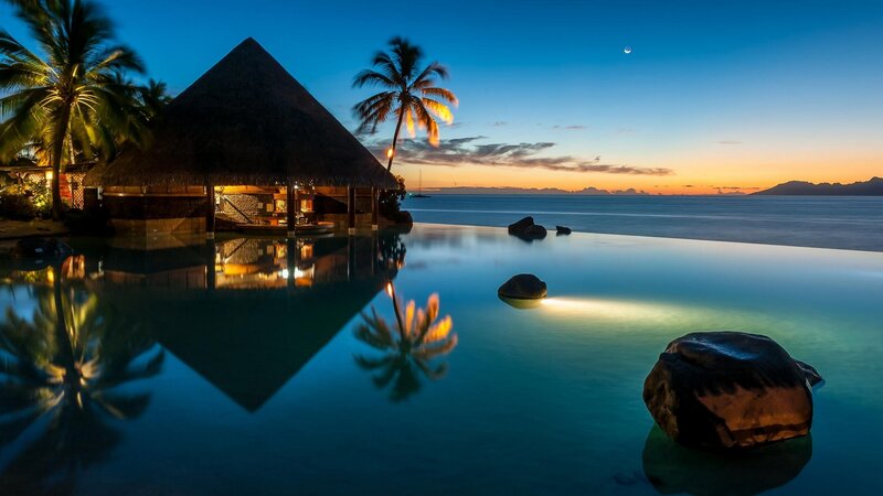 Thatched Hut at Sunset — Blue, Serene, Photograph