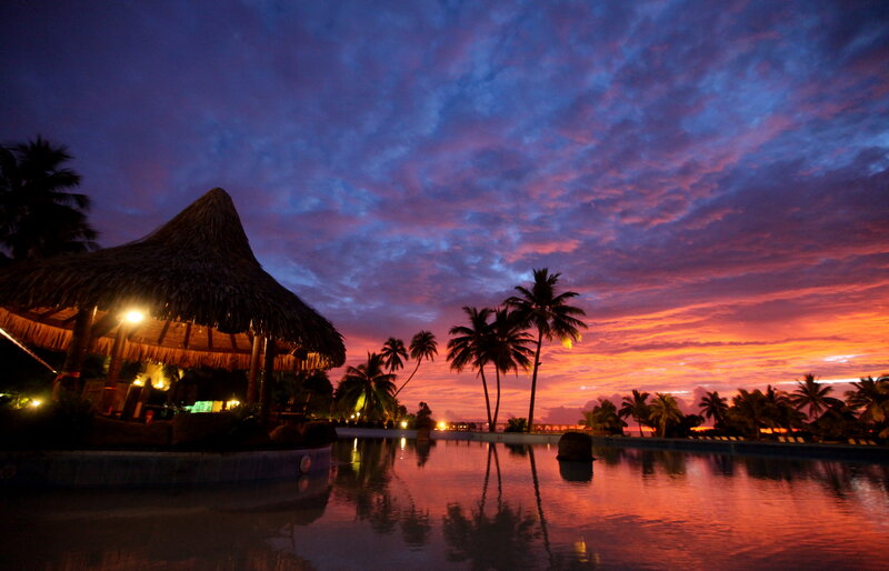 Thatched Hut at Sunset — Purple