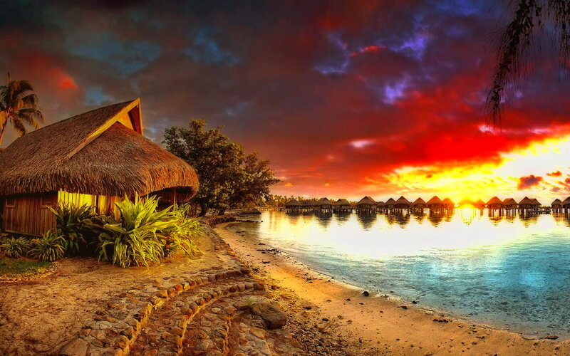 Thatched Hut at Sunset — Red