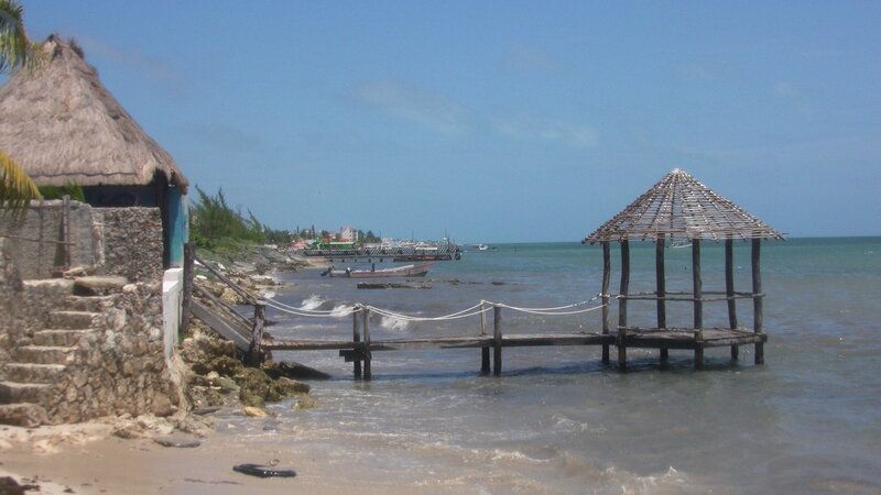 Thatched Hut on Beach — Blue, Serene, Afternoon, Photograph, Pier