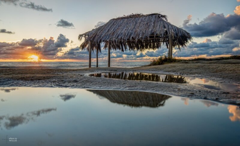 Thatched Hut on Beach — Blue, Serene, Sunset, Photograph, Ocean