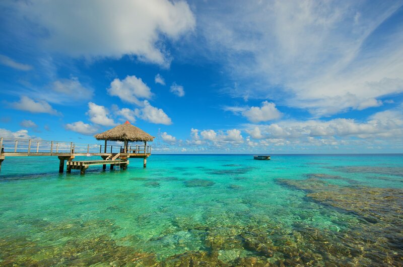 Thatched Hut on Pier — Blue, Serene, Afternoon, Photograph, Boat