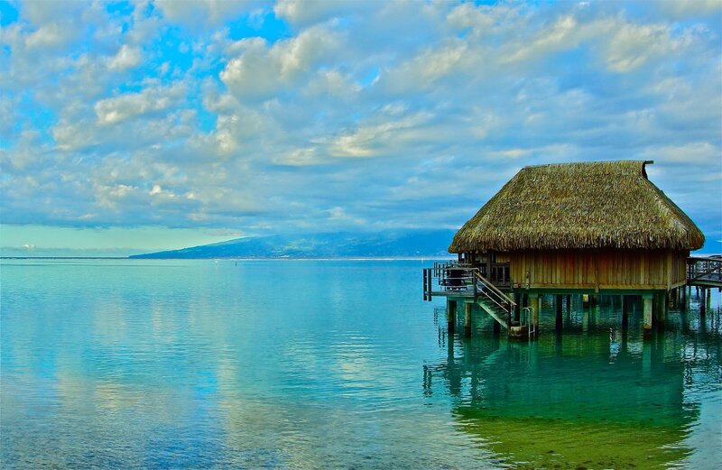 Thatched Hut on Water — Blue, Serene, Afternoon, Photograph, Ocean