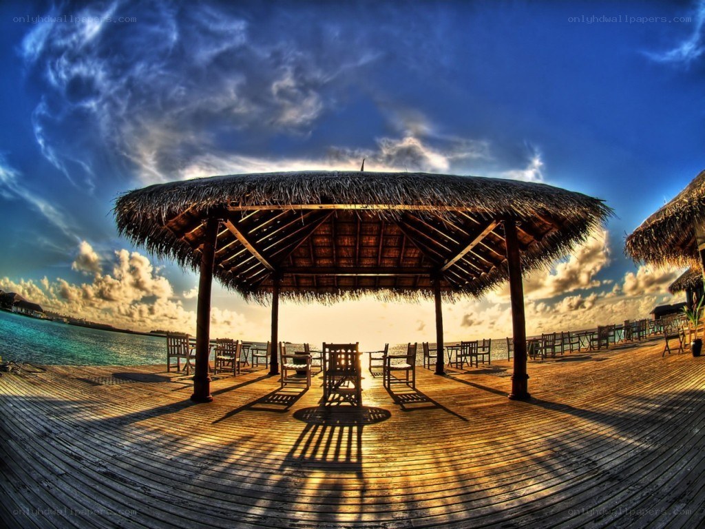 Thatched hut on wooden deck