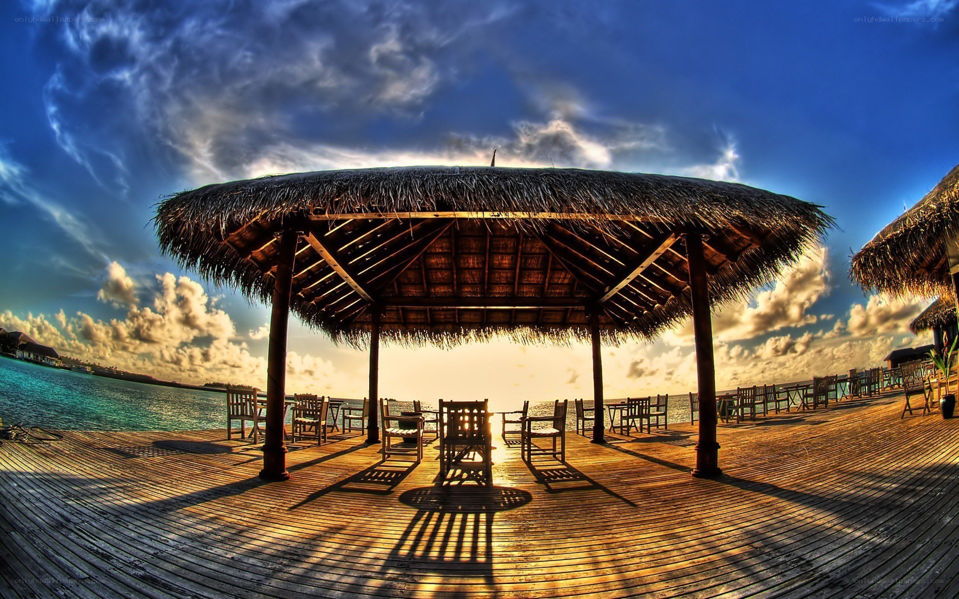Thatched hut on wooden deck