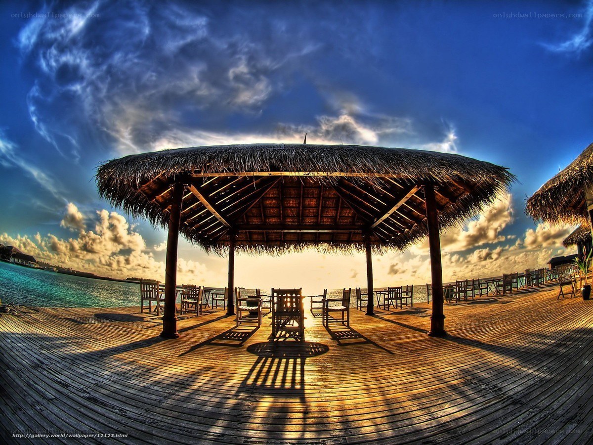 Thatched hut on wooden deck