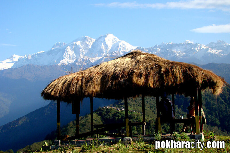 Thatched Hut with Mountains