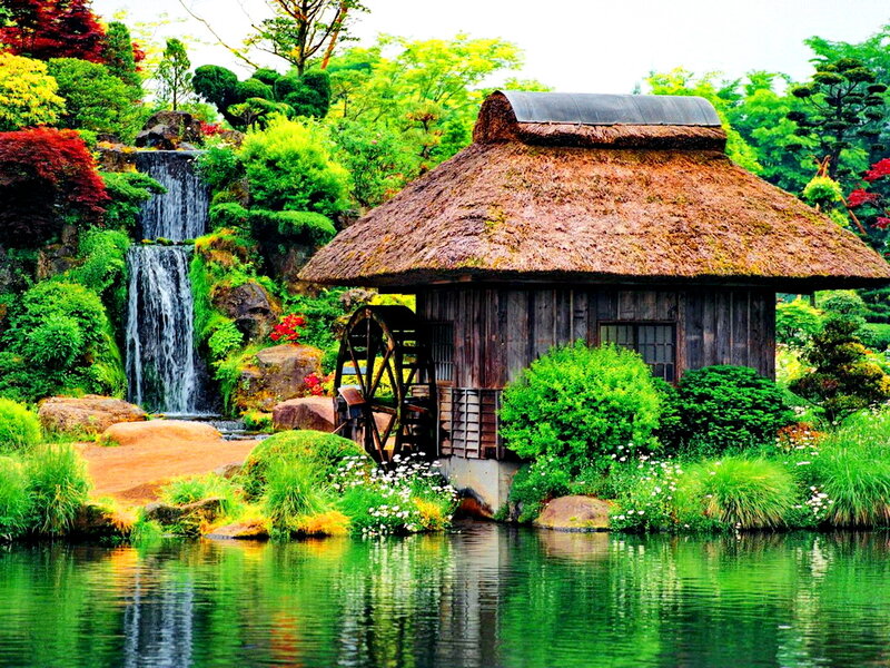 Thatched Hut with Waterwheel