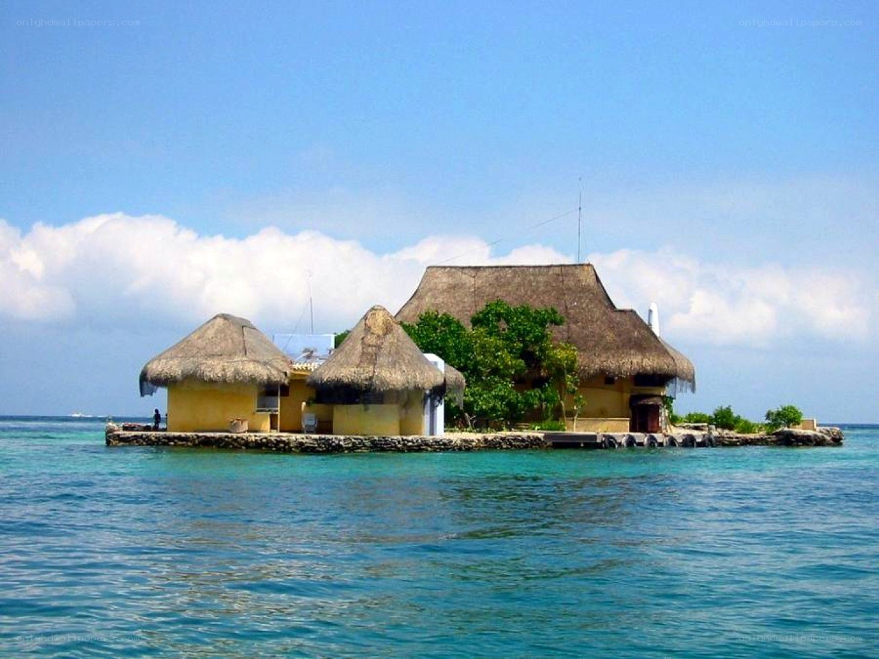 Thatched huts on a small island