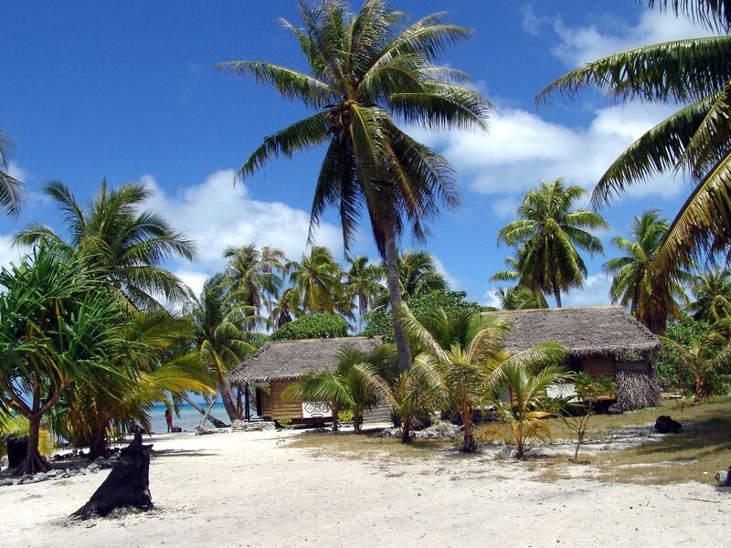 Thatched Huts on Beach — Afternoon