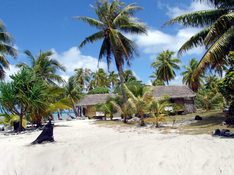 Thatched Huts on Beach — Blue, Serene, Afternoon