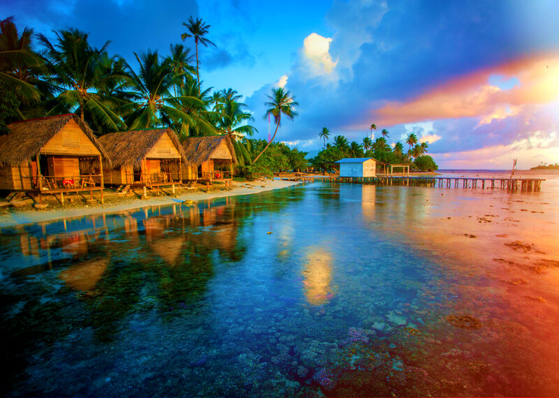 Thatched Huts on Beach — Blue, Serene, Sunset, Photograph