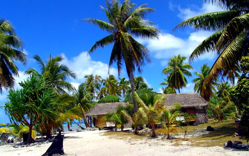 Thatched Huts on Beach — Blue, Serene