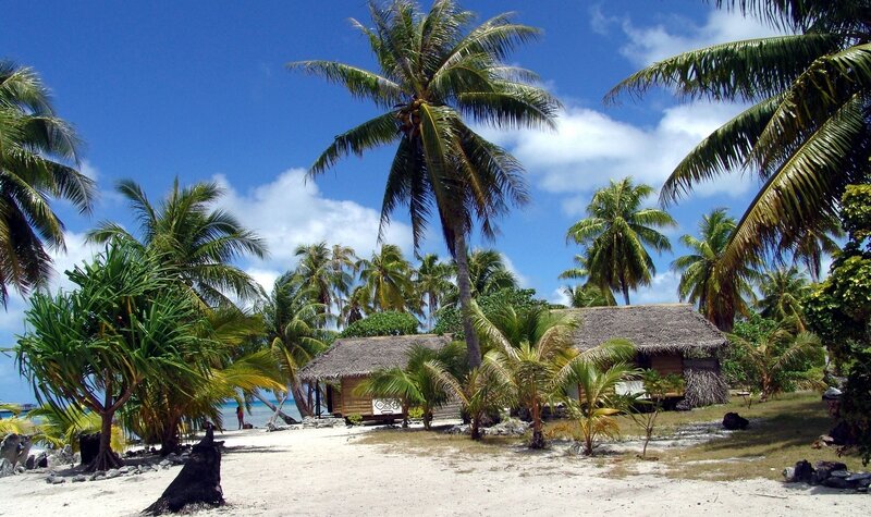 Thatched Huts on Beach — Blue