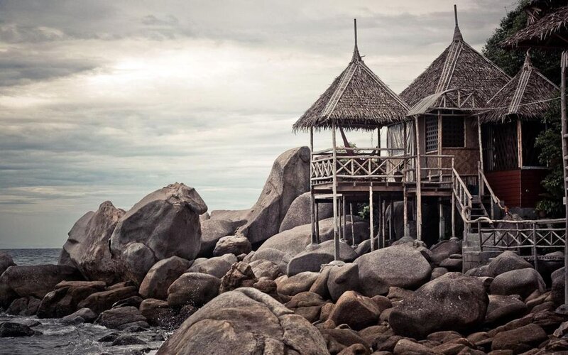 Thatched Huts on Rocks — Gray