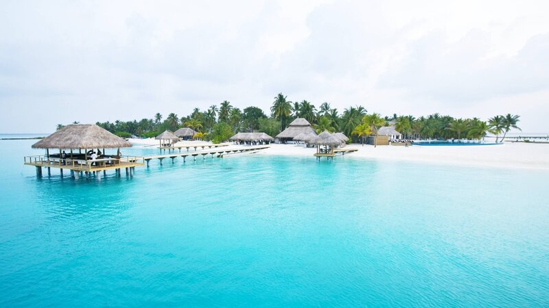Thatched Huts on Water — Blue, Serene, Afternoon, Photograph, Palm Trees, Beach