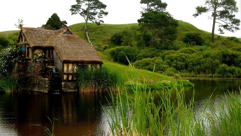 Thatched Mill by River — Green, Serene, Afternoon, Photograph, Hills