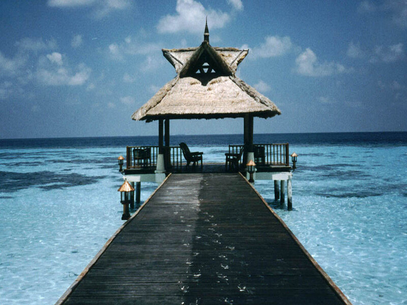 Thatched Pavilion on Pier — Blue, Serene, Afternoon