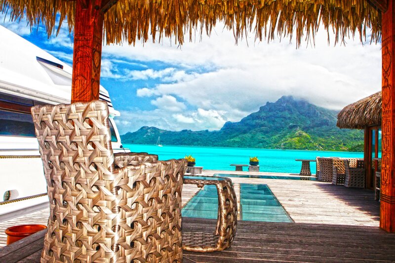 Thatched-roof Bungalow — Blue, Serene, Afternoon, Photograph, Ocean