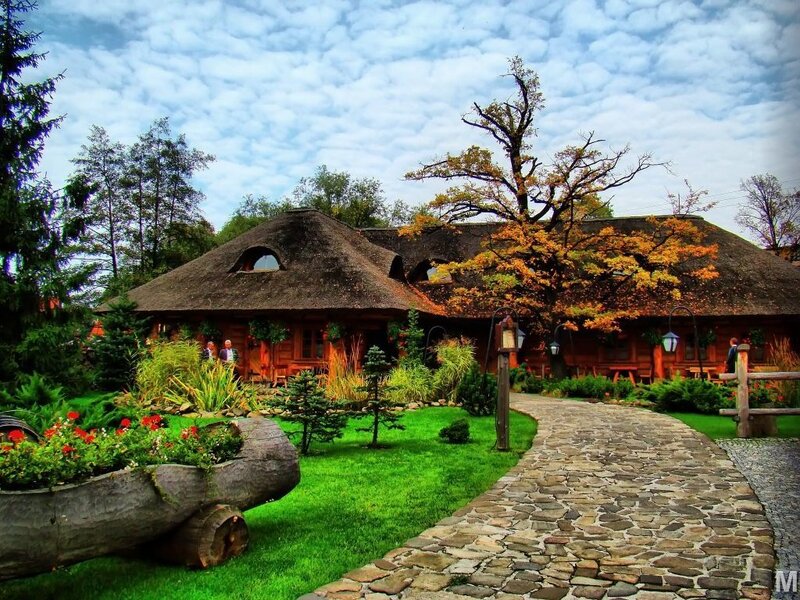 Thatched-roof cottage in autumn