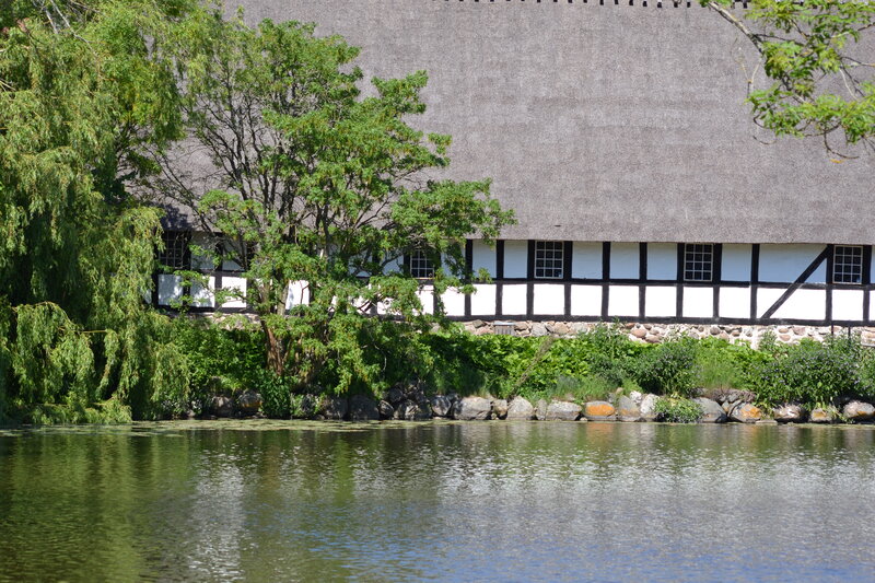 Thatched-roof House — Green, Serene, Afternoon, Photograph, River