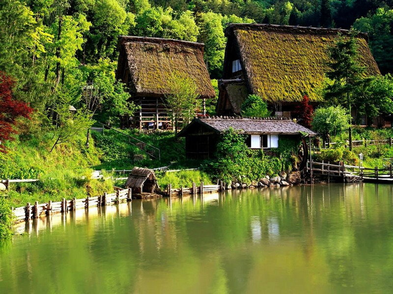 Thatched-roof Houses — Green, Serene, Spring