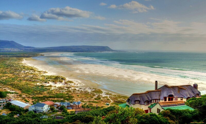 Thatched-roof Houses on Coast