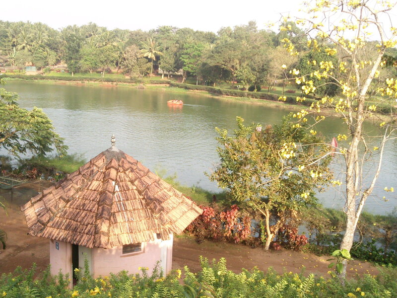Thatched-roof Hut by Lake
