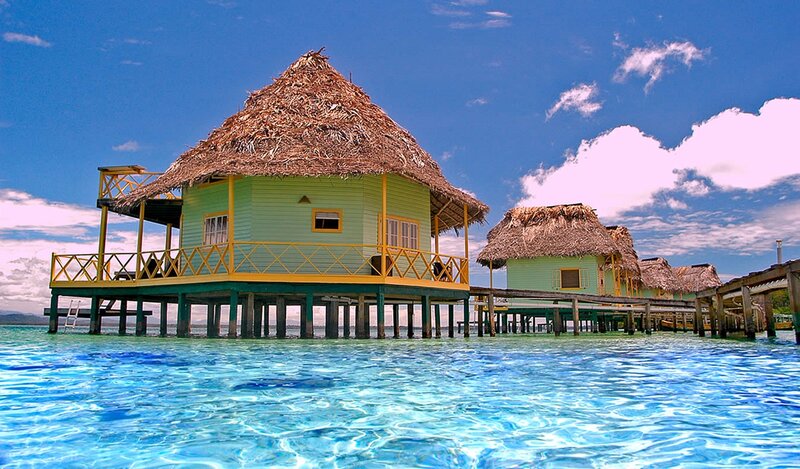 Thatched-roof Huts — Blue, Serene