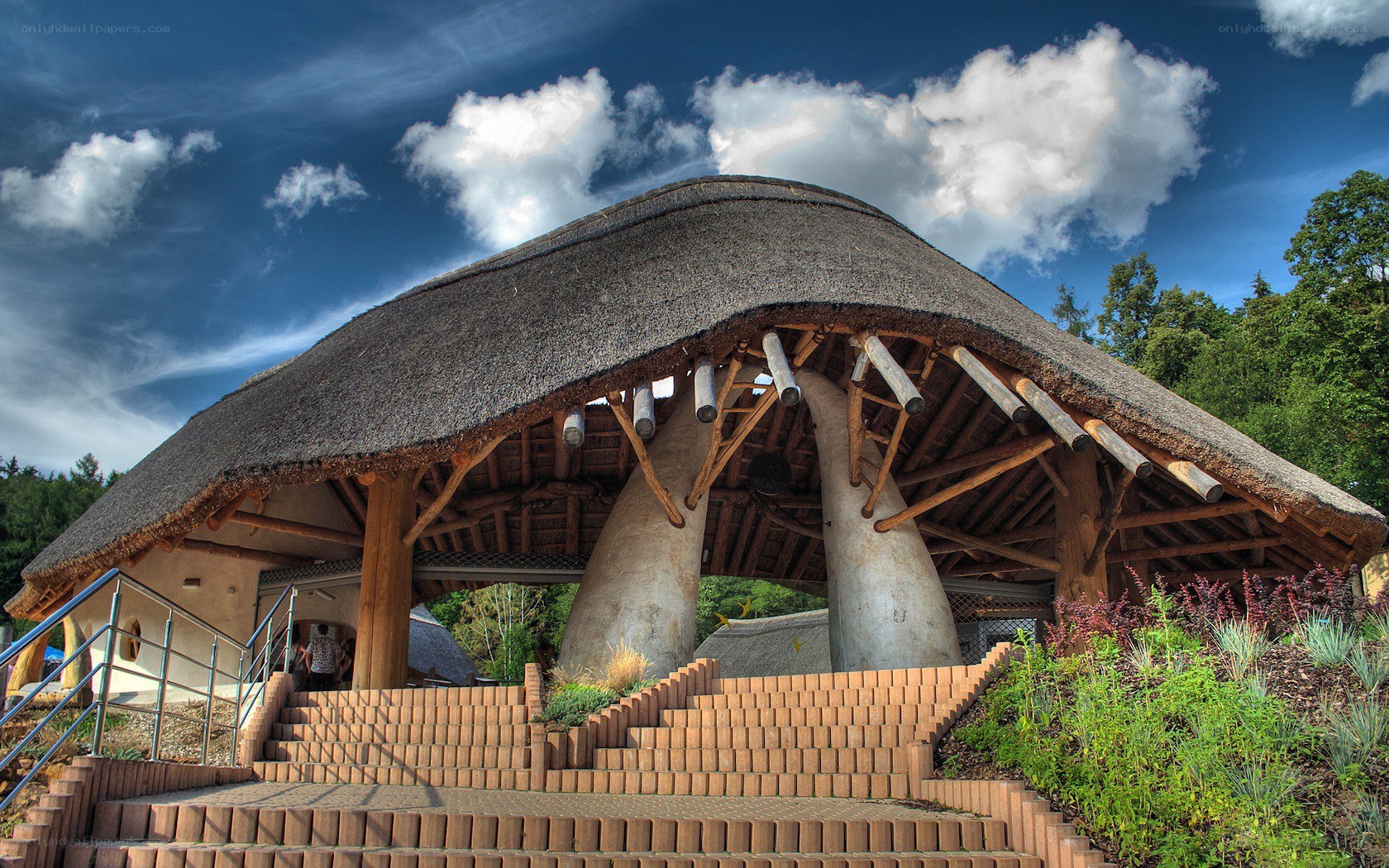 Thatched roof structure with stairs