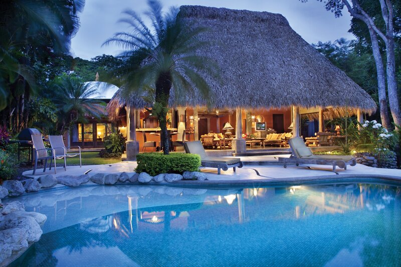 Thatched-roof Villa at Night — Blue