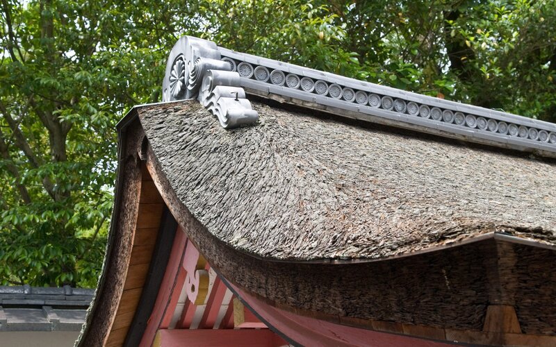 thatched roof with decorative tiles