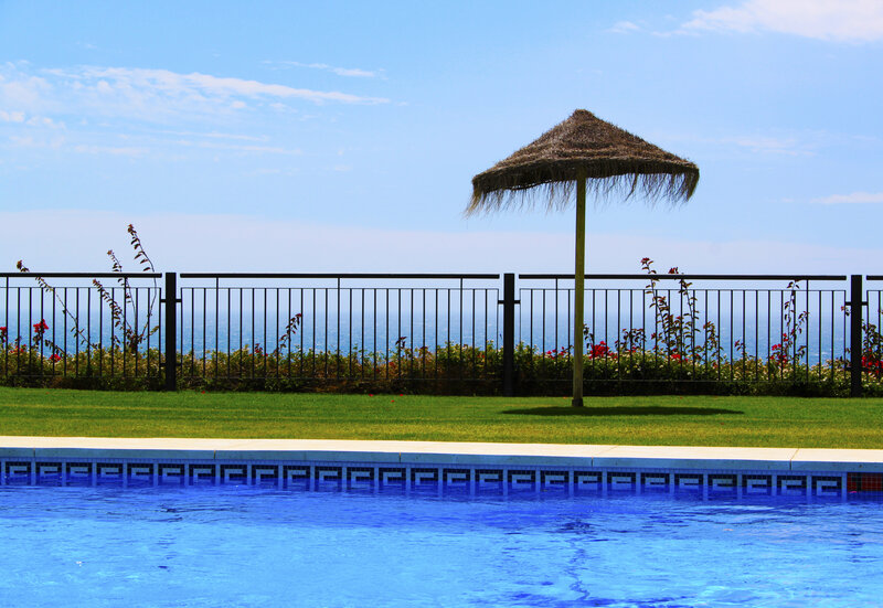 Thatched Umbrella by Pool