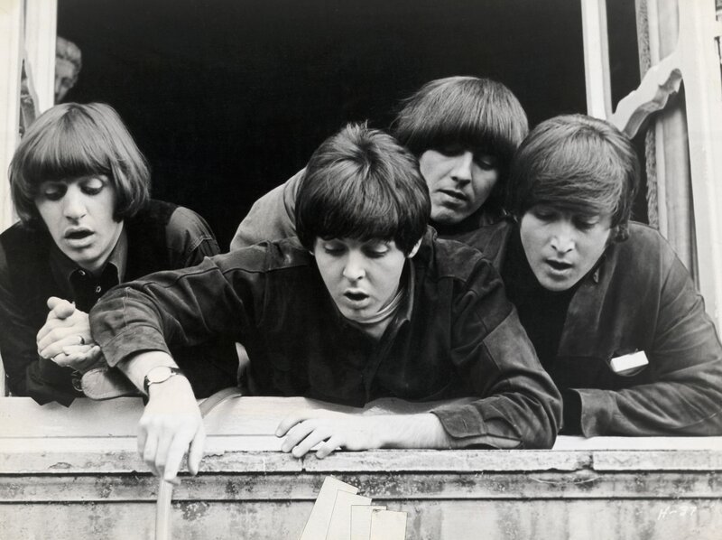 The Beatles at a window