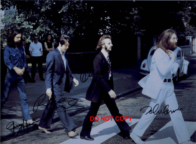 The Beatles crossing the street