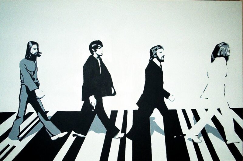 The Beatles crossing the street