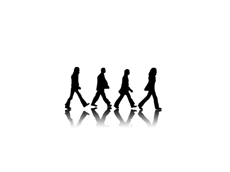 The Beatles crossing the street
