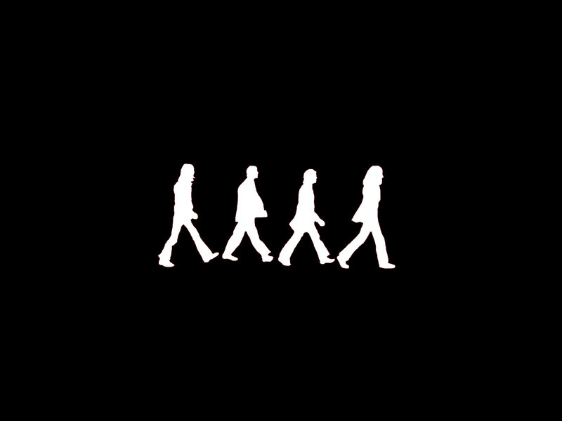 The Beatles crossing the street