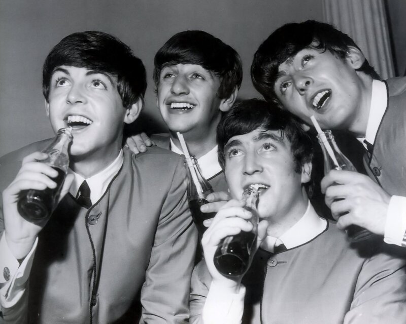 The Beatles drinking coca-cola