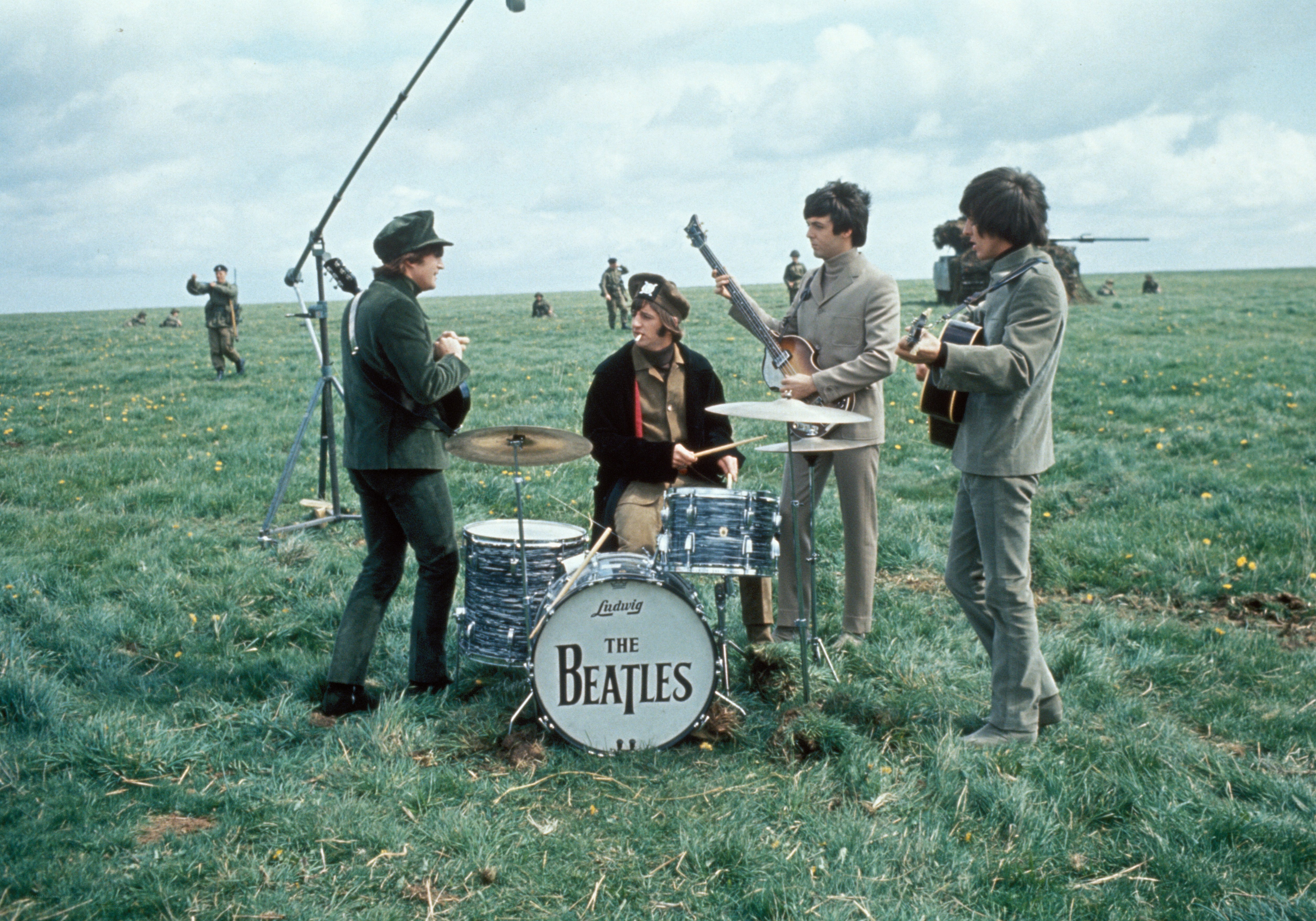 The Beatles in a field